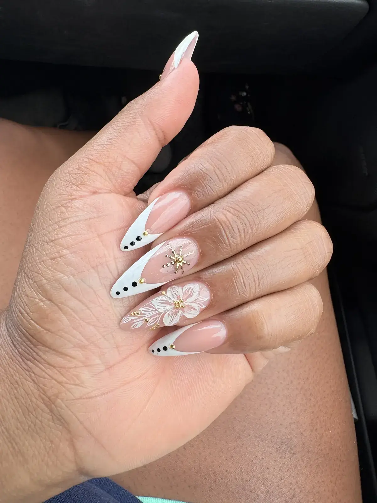 White French stiletto Gel-X style set with hand-painted floral art at Nails Trend